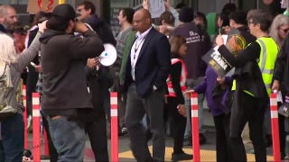 May Day protesters gather outside San Francisco International Airport
