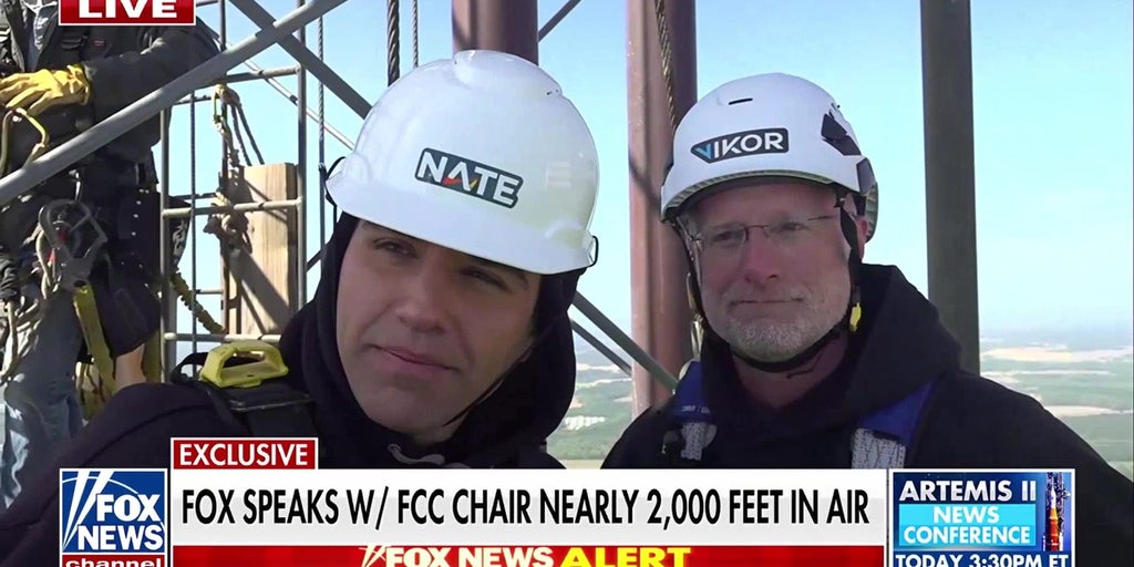 FCC chairman climbs 2,000-foot broadcast tower