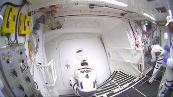 Hatch on Artemis II capsule closes as astronauts prepare for lunar mission