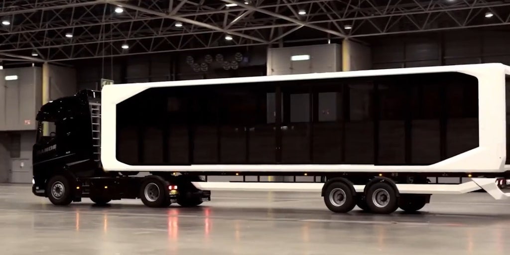 Luxury glass trailer unfolds into a ground-level spacious home in just 15 minutes