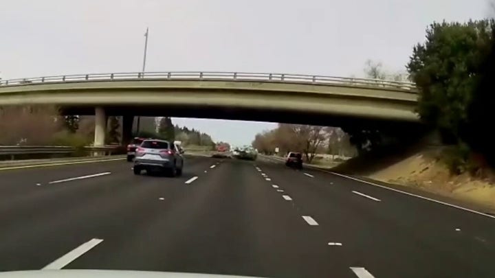Dash cam video shows car flying off California highway overpass