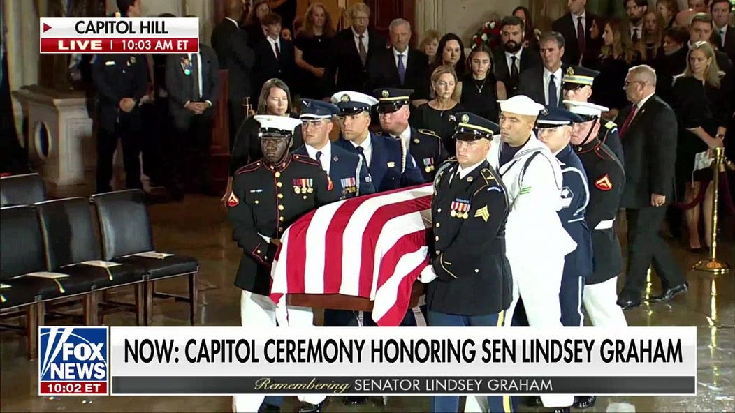 Military honor guard carries Sen. Lindsey Graham's casket into Capitol Rotunda