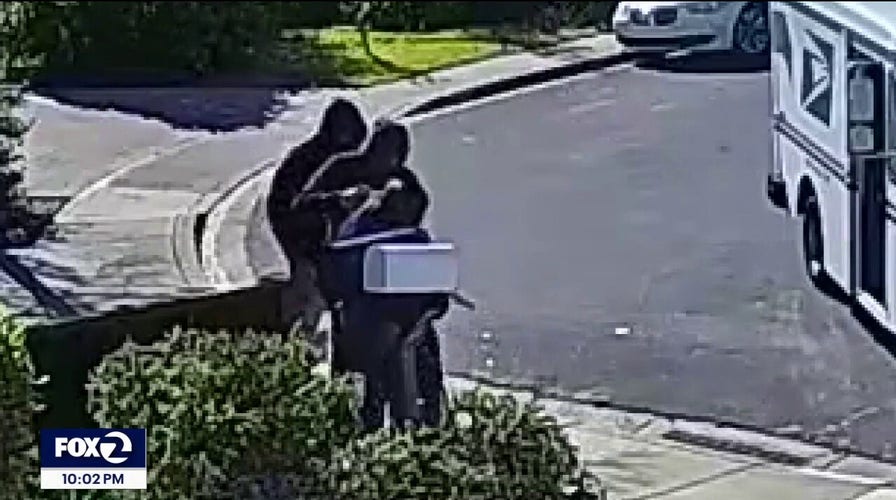 California postal worker robbed by masked assailants in attack caught on surveillance video