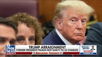 Trump glares at Alvin Bragg during arraignment