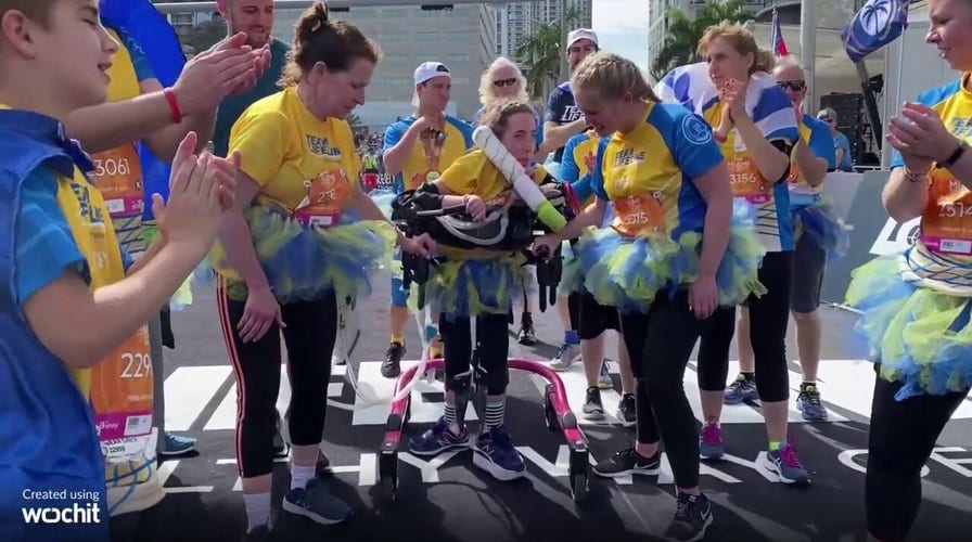 Going the extra mile: Woman with muscular dystrophy completes 12 half-marathons to raise funds