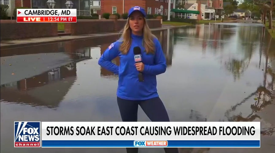 Storms soak East Coast, causing widespread flooding