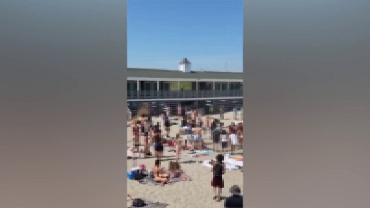 3 stabbed on Rhode Island beach, teens sent running