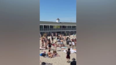 3 stabbed on Rhode Island beach, teens sent running