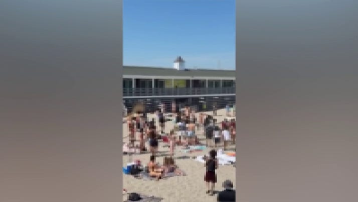 3 stabbed on Rhode Island beach, teens sent running