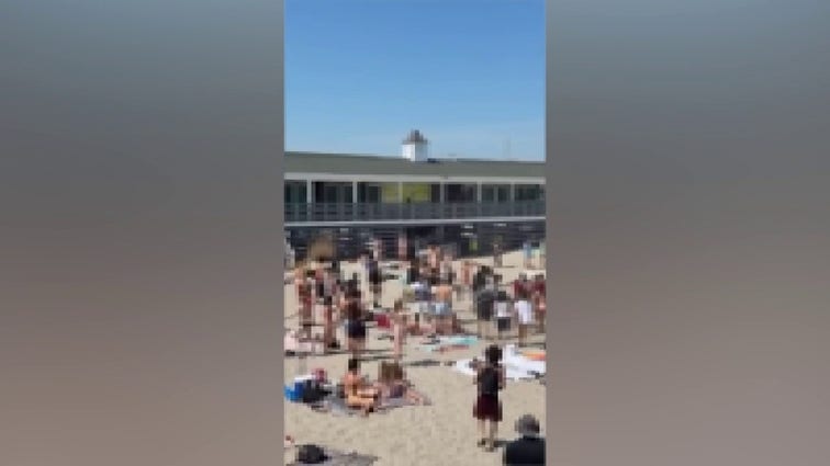 3 stabbed on Rhode Island beach, teens sent running