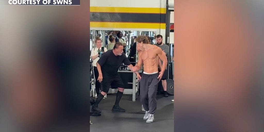 Arnold Schwarzenegger trains lookalike son Joseph Baena at gym as bodybuilding buzz grows