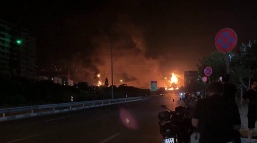 Flames billow across Tehran in dramatic scene after Israeli strike