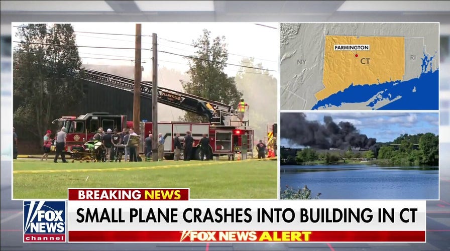 Small plane crashes into building in Connecticut