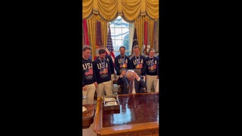 Trump wears Olympic gold medal at White House