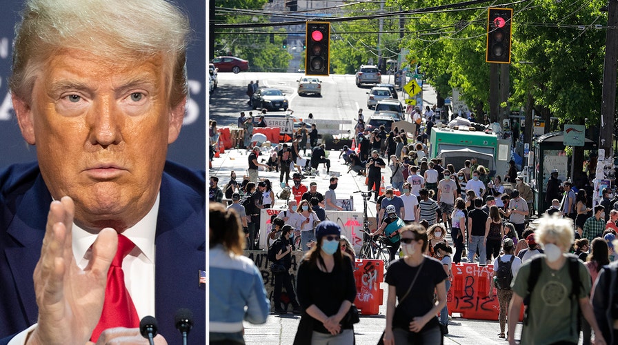 Seattle protesters claim 'cop free' zone as Trump demands local leaders take back control of their city