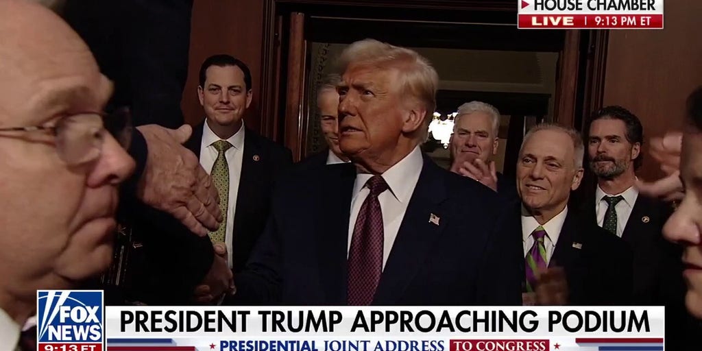 President Donald Trump enters House Chamber for joint address to rousing ovation
