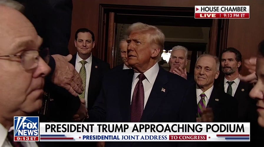  President Donald Trump enters House Chamber for joint address to rousing ovation