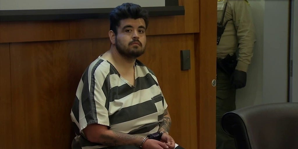 Suspected Walgreens shooter smiles in first court appearance