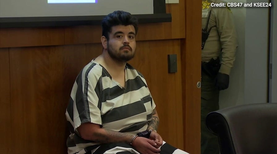 Suspected Walgreens shooter smiles in first court appearance