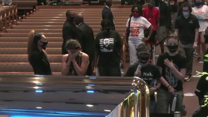 Mourners pay respects to George Floyd at public viewing in Texas