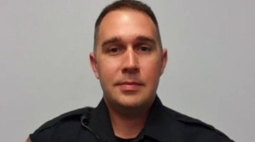 Hero deputy officer single-handedly lifts car to free pinned woman