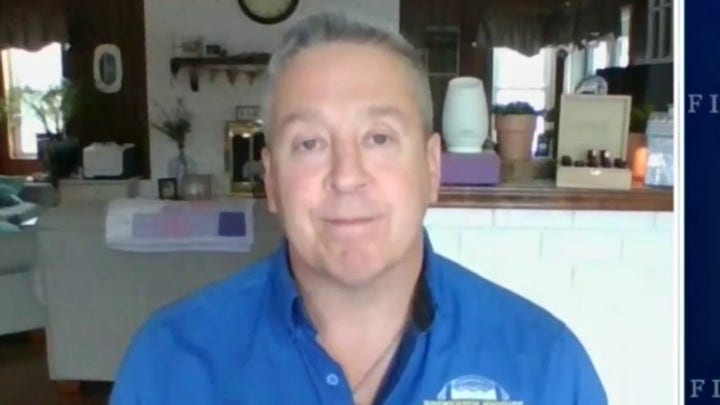 School district fires football coach over silent prayer on field