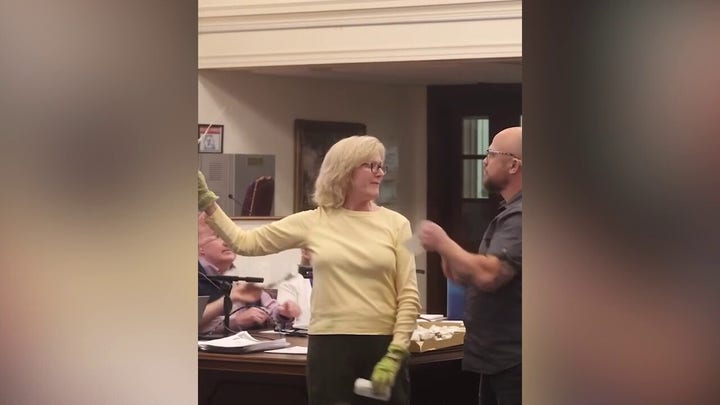 Rhode Island police released video of a person involved in a heated wind farm forum