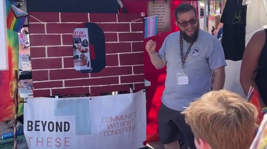 Seattle Pride booth lets child throw makeshift brick at 'basket of deplorables'