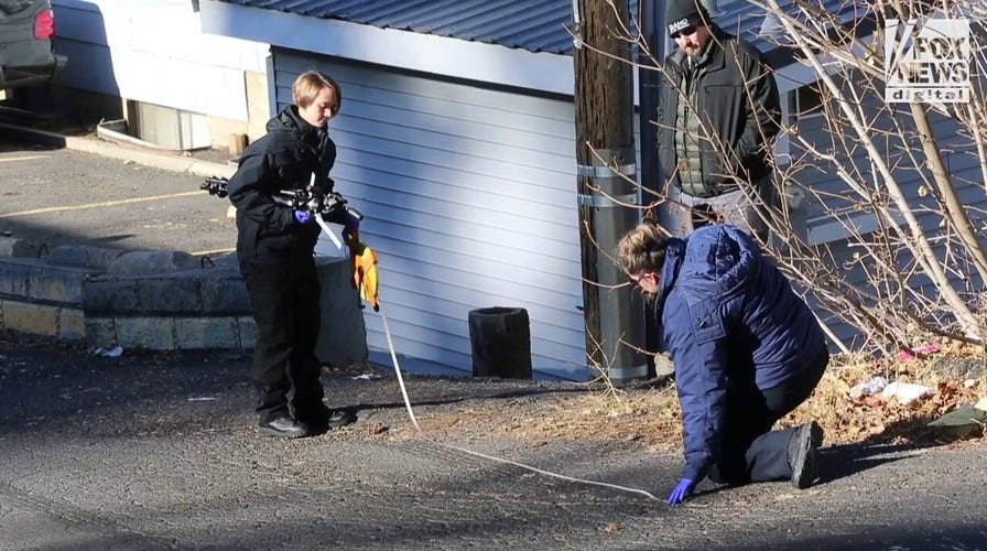 A forensics team returned to the street in front of the Idaho crime scene to measure tire marks