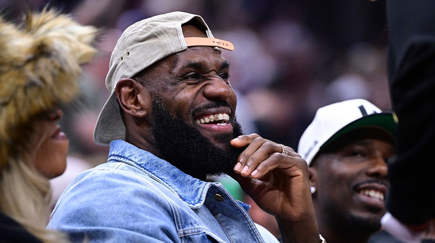 LeBron James sits courtside at Cavaliers playoff game