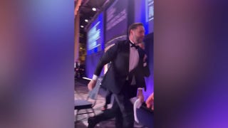 U.S. Vice President JD Vance is escorted by Secret Service after a shooting at the White House Correspondents' Dinner