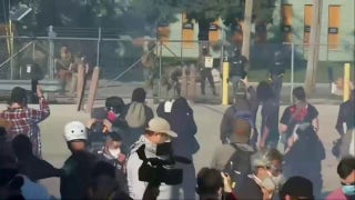 Law enforcement fires pepper balls at anti-ICE protesters near Chicago