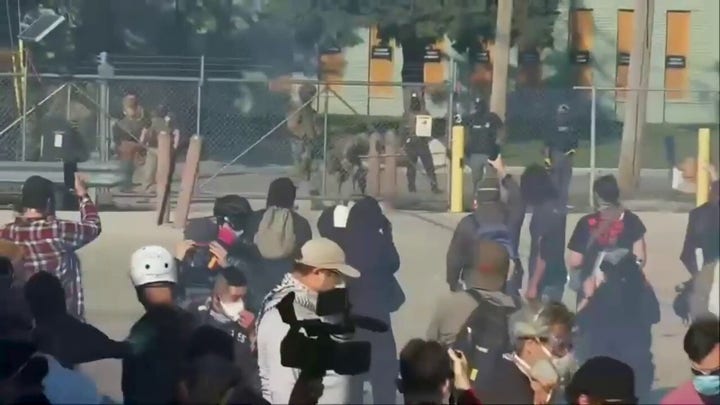 Law enforcement fires pepper balls at anti-ICE protesters near Chicago