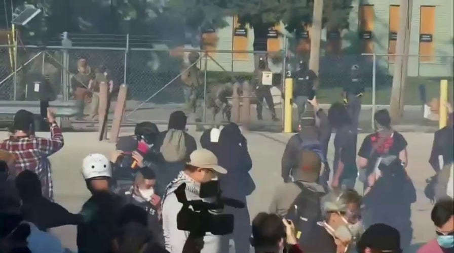 Law enforcement fires pepper balls at anti-ICE protesters near Chicago