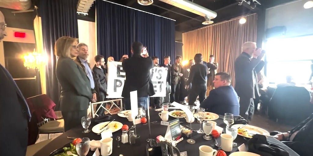 Angry disruptors crash event to protest Republican congressman speaker