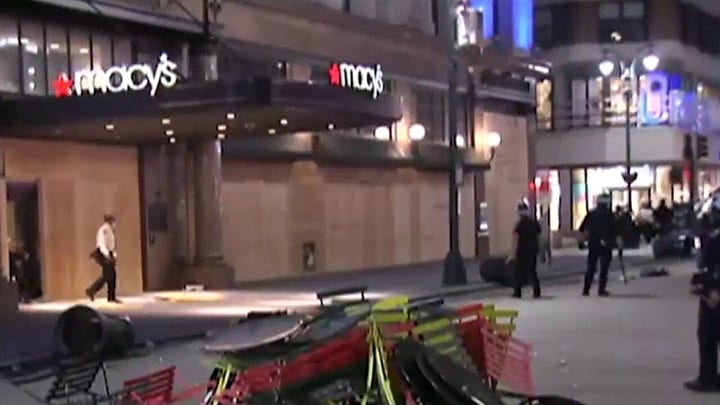 Iconic NYC stores boarded up after another night of looting and violence