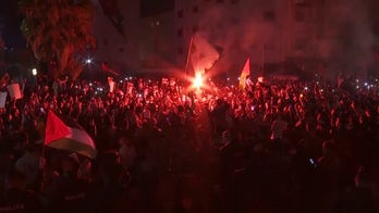 Jordanian security forces hold back protesters calling for a siege of the Israeli embassy in Amman last week