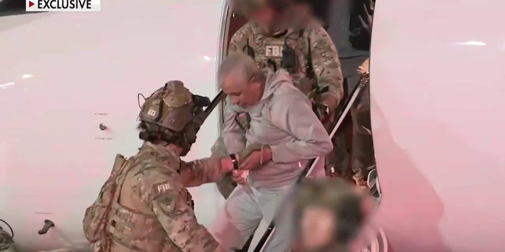 Exclusive video shows Benghazi terror suspect arrested and in FBI custody in DC