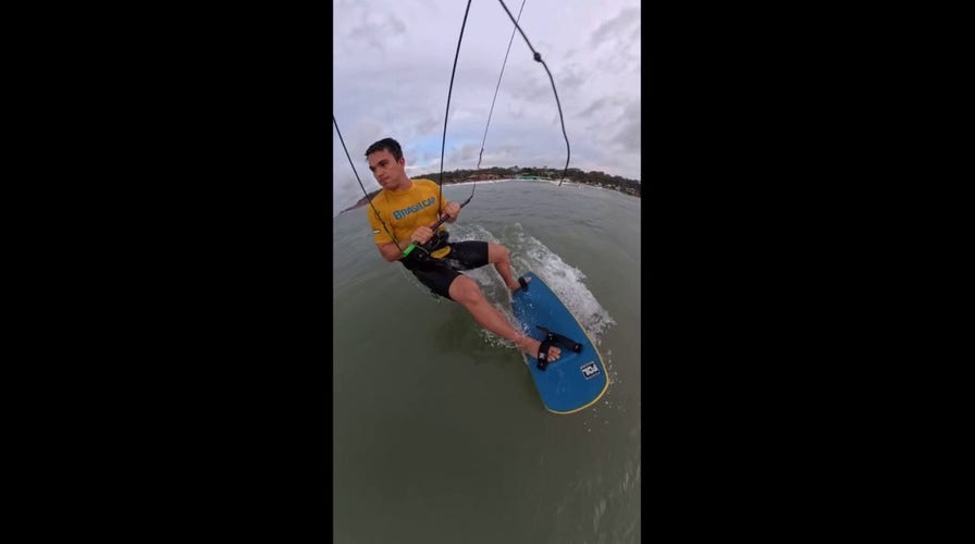 Olympic kitesurfer saves woman from drowning