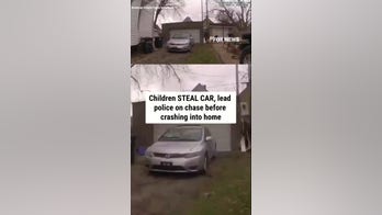Children STEAL CAR, lead police on chase before crashing into home