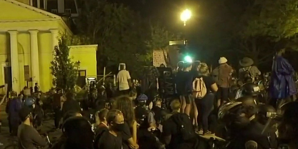 Trump orders arrests for monument vandalism as protesters try to topple