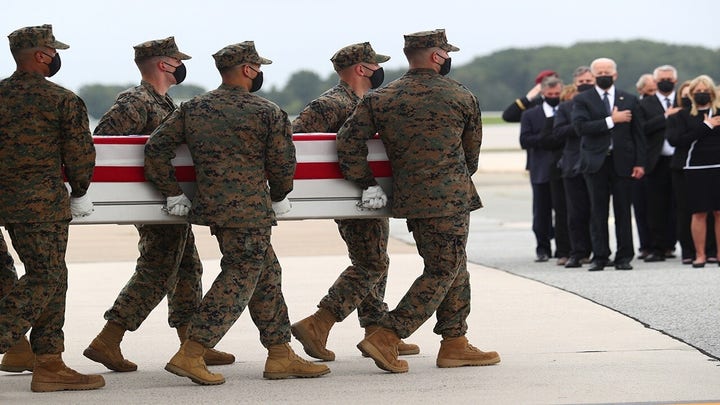 Biden appears to check his watch at ceremony honoring 13 fallen troops: Report