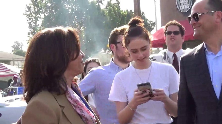 Then-Sen. Harris chants down, down with deportation at 2018 parade
