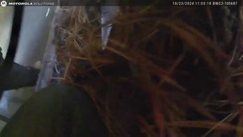 Dramatic rescue of woman from a small basement window of a burning home in Ohio