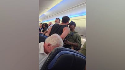 WATCH: Video shows police escort unruly passenger off United flight