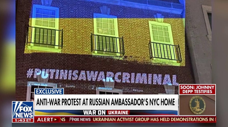 Protesters project Ukrainian flag on Russian UN ambassador’s NYC mansion