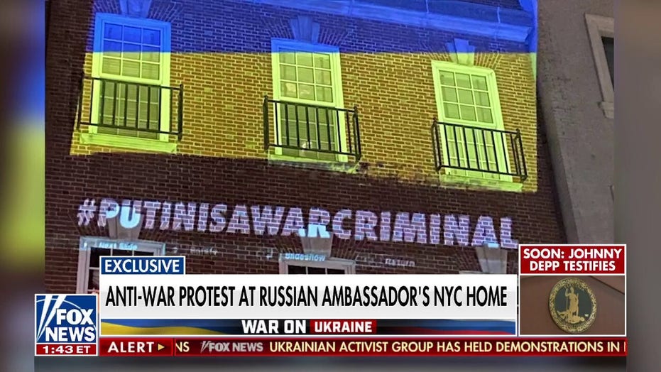 Protesters project Ukrainian flag on Russian UN ambassador’s NYC mansion