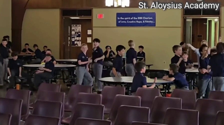 Students at St. Aloysius Academy in Pennsylvania cheer after Pope XIV appointment