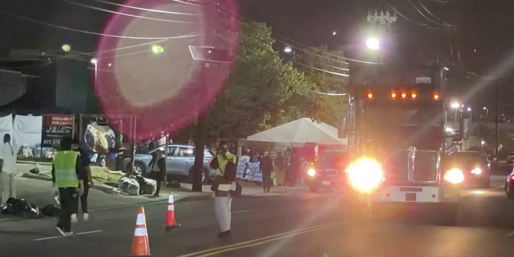 Anti-ICE agitators seen directing traffic outside Delaney Hall detention center