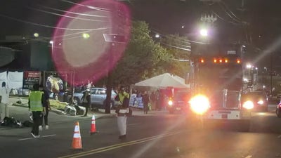 Anti-ICE agitators seen directing traffic outside Delaney Hall detention center
